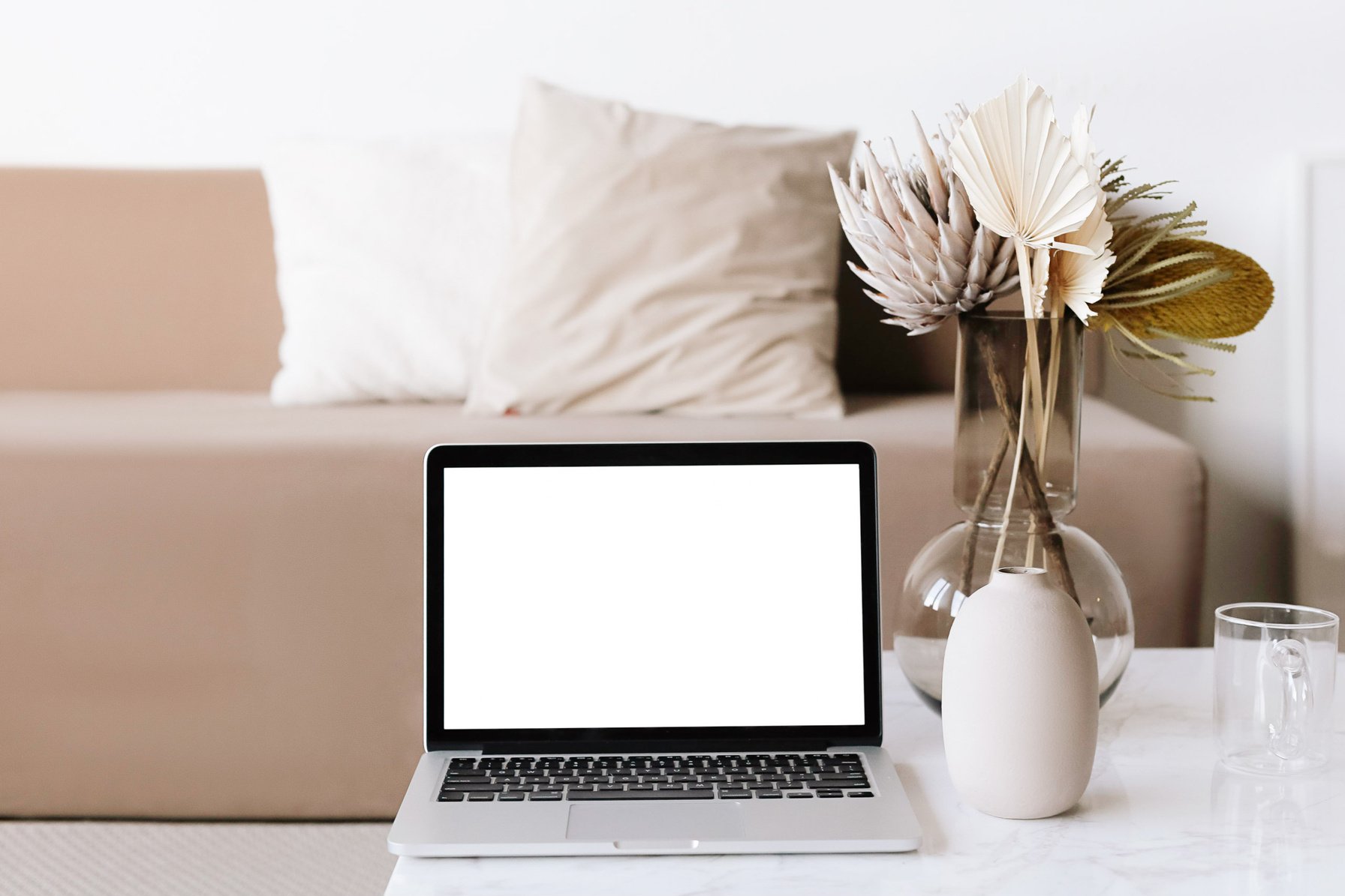 Macbook Pro on White Table